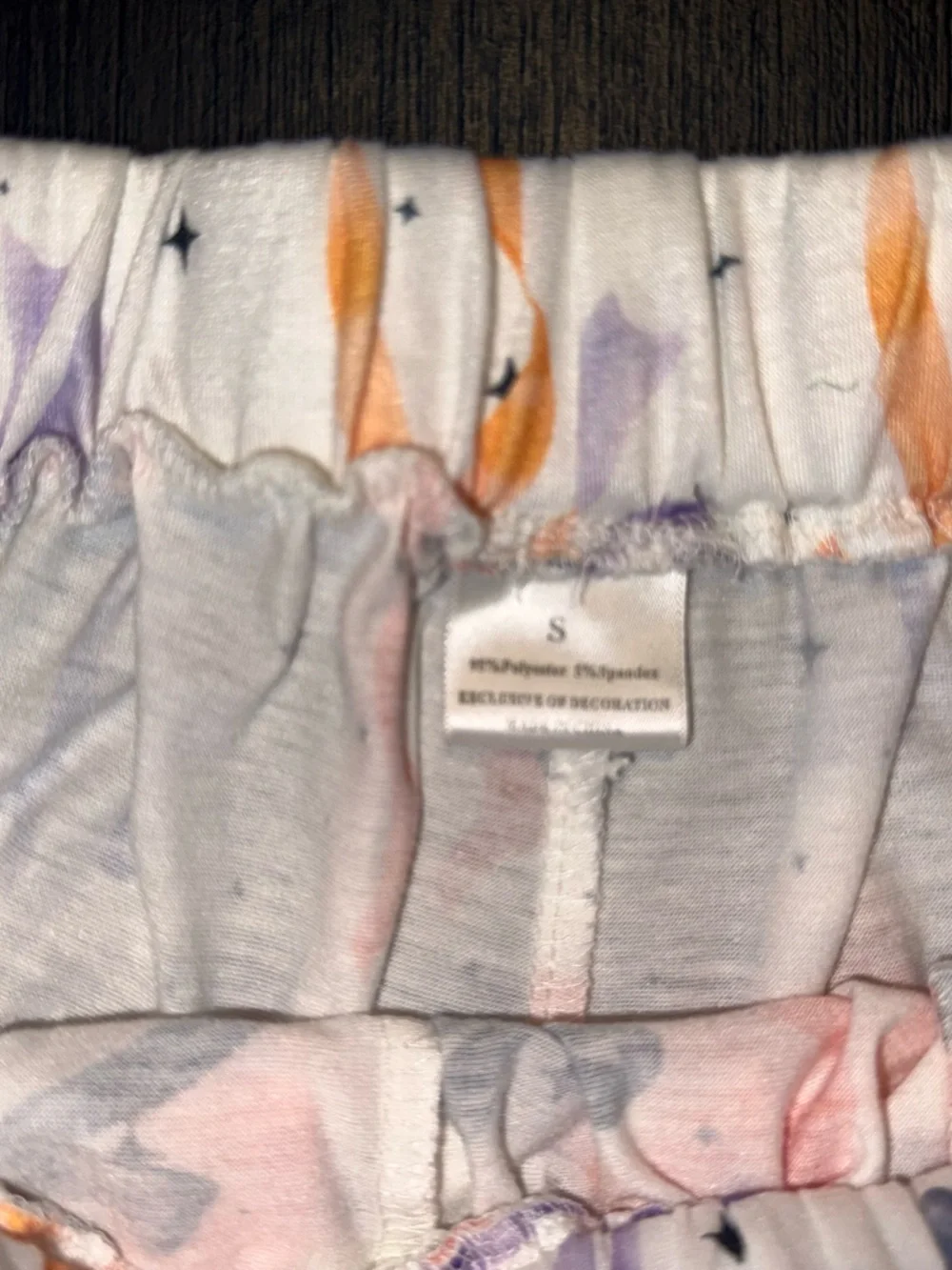 Primark White Elastic Waistband Shorts with Orange and Purple Star Print
